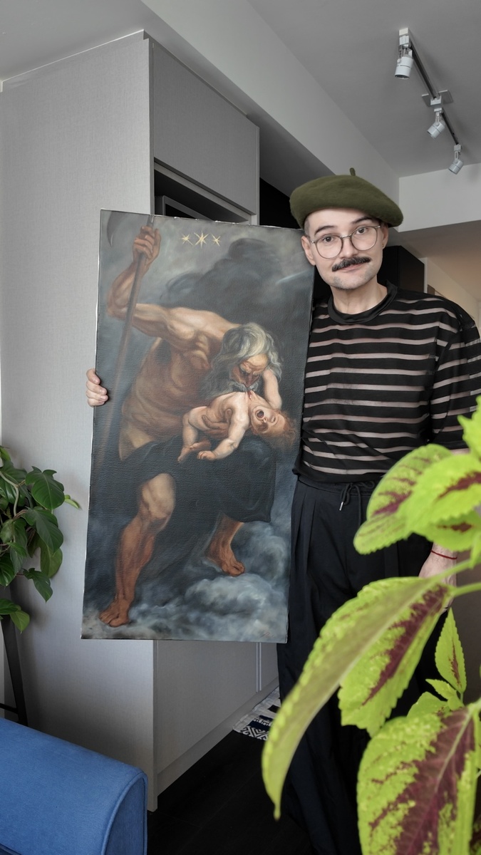 Régis Souto holding his study after Rubens, Saturn Devouring a Son